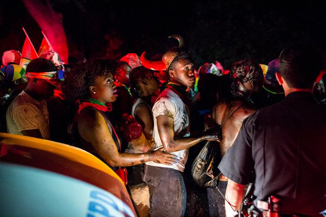 Police look on during J'Ouvert 2016.